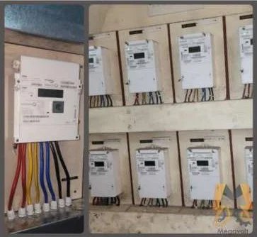 CT-connected meter and a bank of individual DEWA electricity meters in residential buildings in Karama and Deira